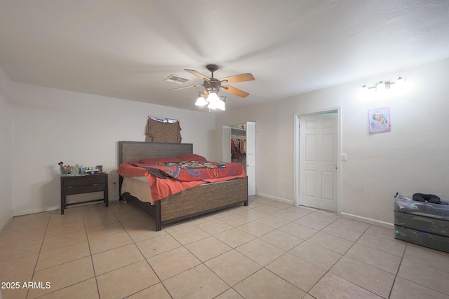 bedroom featuring ceiling fan and light tile patterned floors