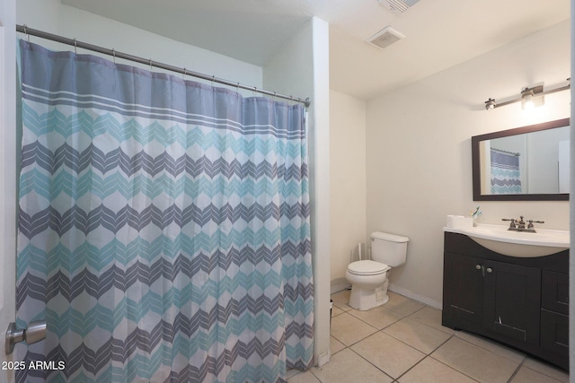 bathroom with walk in shower, tile patterned flooring, vanity, and toilet