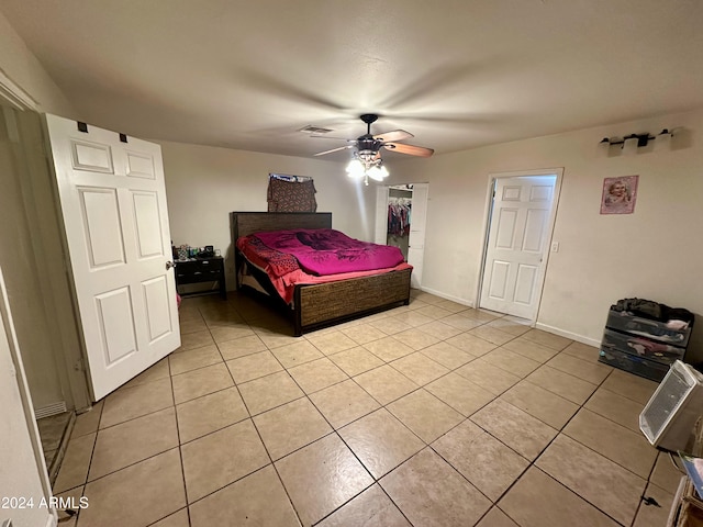 bedroom featuring ceiling fan and light tile patterned flooring