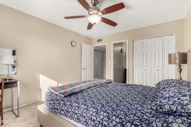 bedroom featuring a closet, ceiling fan, and carpet floors