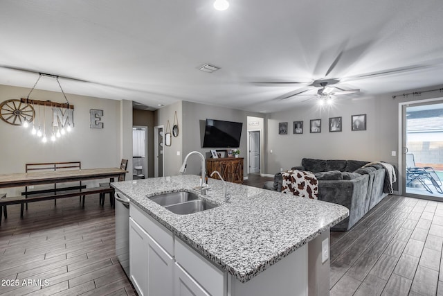 13657 W Paso Trl, Peoria, AZ 85383 - kitchen with a sink, wood tiled floors, open floor plan, and white cabinets
