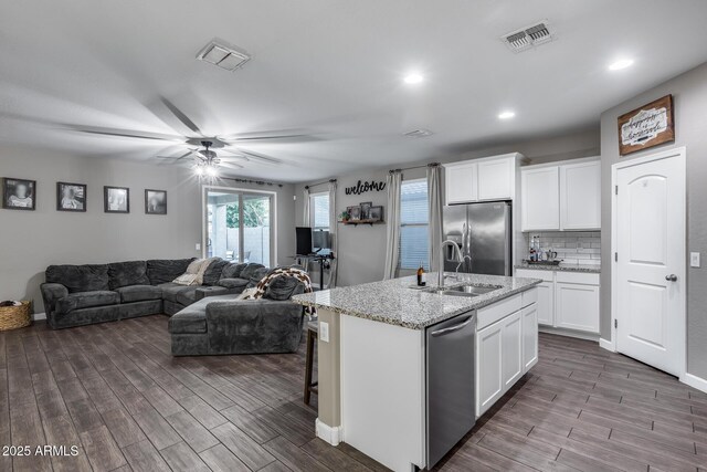 13657 W Paso Trl, Peoria, AZ 85383 - kitchen featuring stainless steel appliances, a sink, dark wood-type flooring, ceiling fan, and recessed lighting