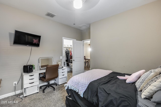 13657 W Paso Trl, Peoria, AZ 85383 - bedroom with a spacious closet, carpet floors, a desk, a closet, and a ceiling fan