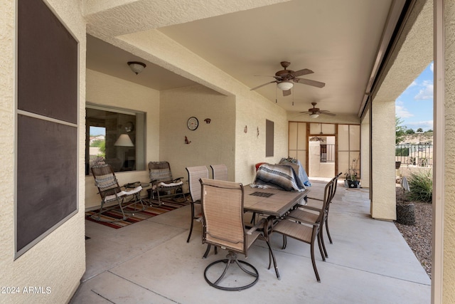 view of patio featuring ceiling fan