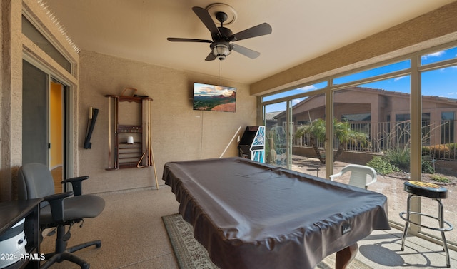 game room with light carpet, pool table, and a ceiling fan