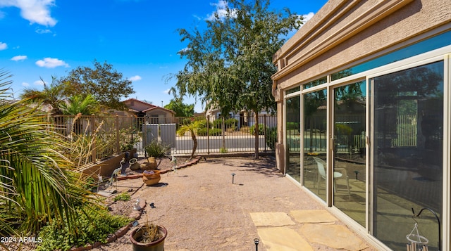 view of yard with a patio and a fenced backyard