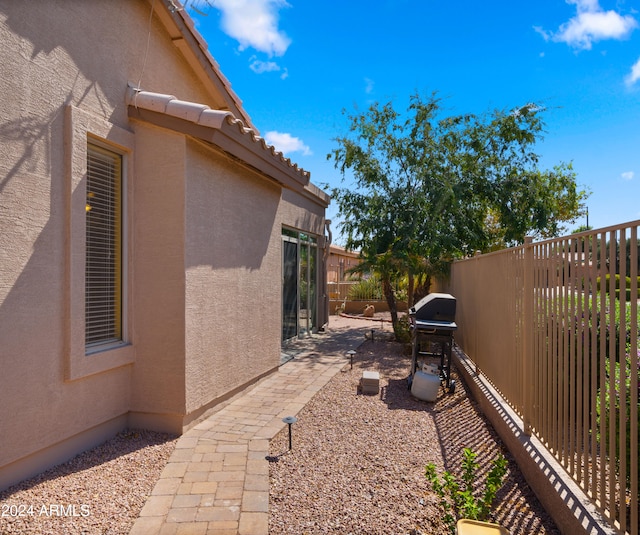 view of yard with a fenced backyard and a patio