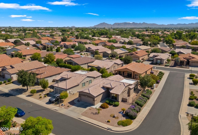 drone / aerial view with a residential view and a mountain view