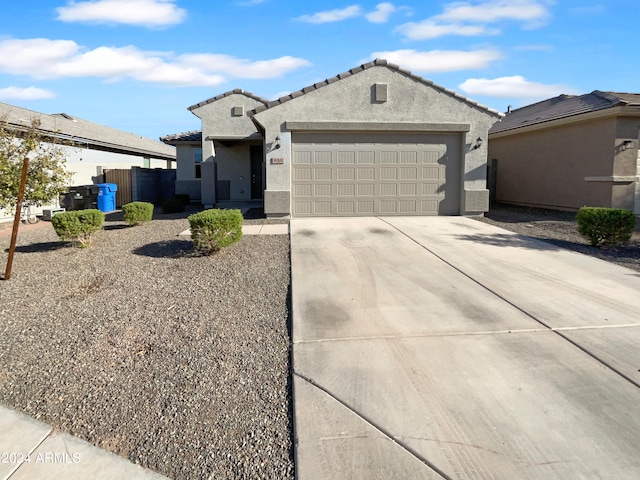 view of front of property with a garage