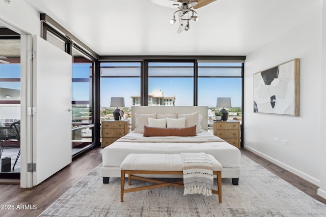 4808 N 24th St Unit 1228, Phoenix, AZ 85016 - bedroom featuring wood finished floors and expansive windows