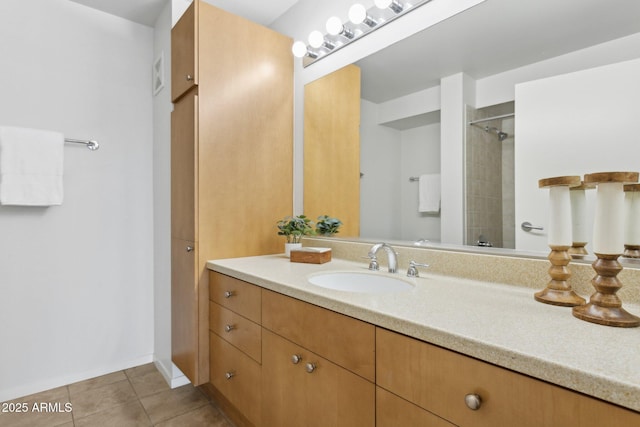 4808 N 24th St Unit 1228, Phoenix, AZ 85016 - bathroom with vanity, tile patterned floors, and a shower