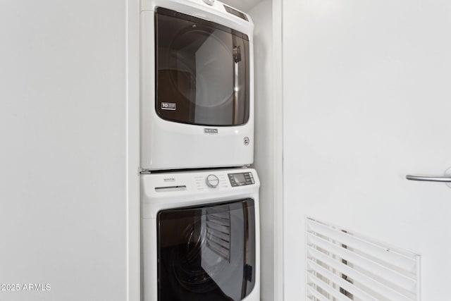 4808 N 24th St Unit 1228, Phoenix, AZ 85016 - washroom with stacked washer / dryer