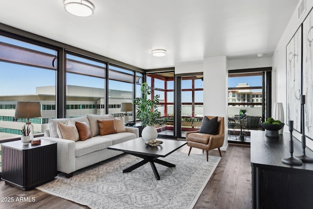 4808 N 24th St Unit 1228, Phoenix, AZ 85016 - living room with wood finished floors and expansive windows