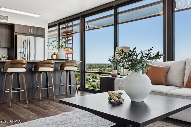 4808 N 24th St Unit 1228, Phoenix, AZ 85016 - dining room with dark wood finished floors and floor to ceiling windows