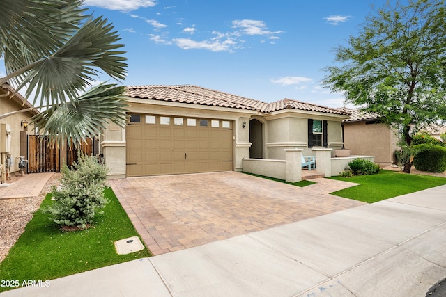 3828 E Liberty Ln, Gilbert, AZ 85296 - mediterranean / spanish-style home featuring a tiled roof, an attached garage, stucco siding, and decorative driveway