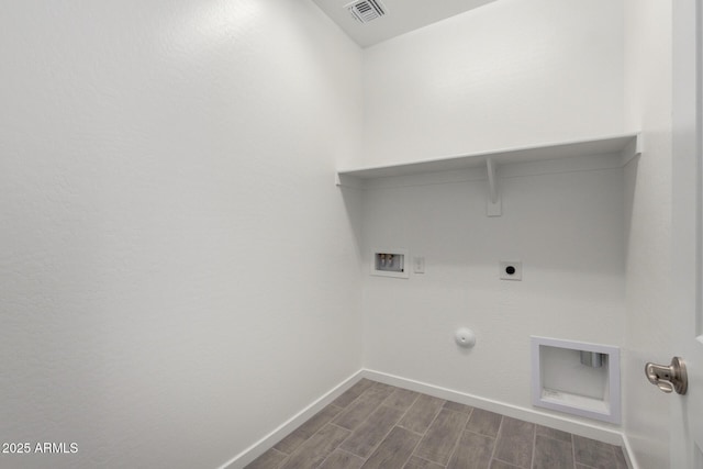 washroom featuring laundry area, visible vents, hookup for a gas dryer, washer hookup, and dark wood-style flooring