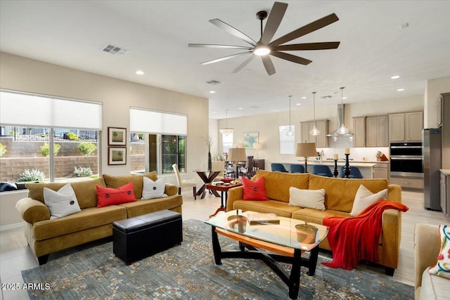 living room with ceiling fan