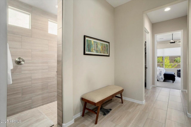 corridor with light hardwood / wood-style floors