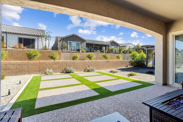 view of yard with a patio area