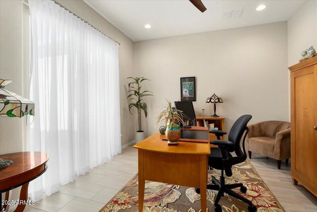 home office featuring light tile patterned floors