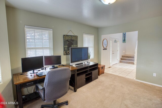 home office with light carpet