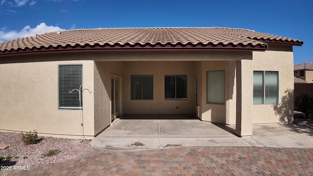 rear view of property with a patio