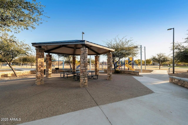 view of property's community featuring a playground