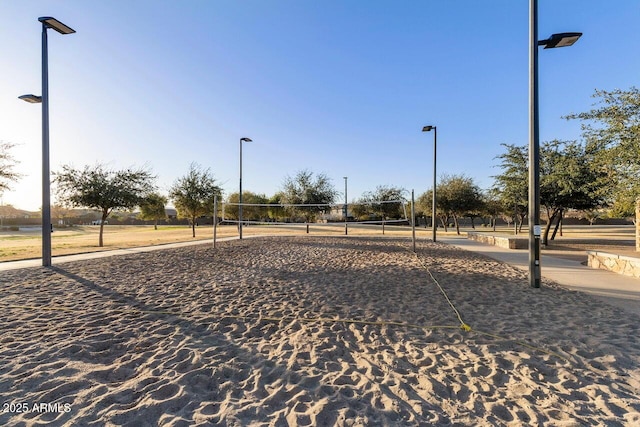 view of property's community featuring volleyball court