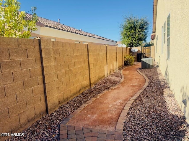 view of yard featuring central AC