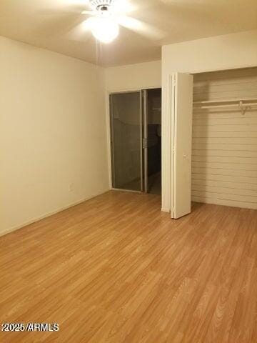 1622 E Campbell Ave Unit L, Phoenix, AZ 85016 - unfurnished bedroom featuring light wood-type flooring, a closet, and ceiling fan