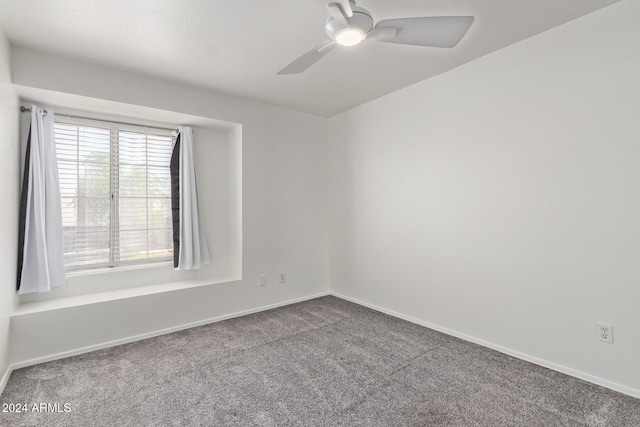 carpeted empty room with ceiling fan