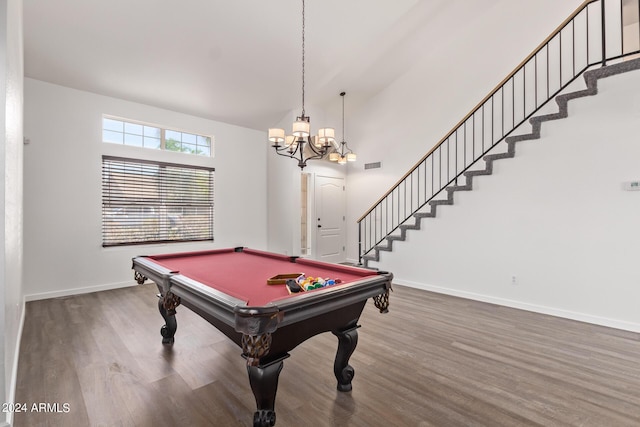 recreation room featuring billiards, visible vents, wood finished floors, baseboards, and a notable chandelier
