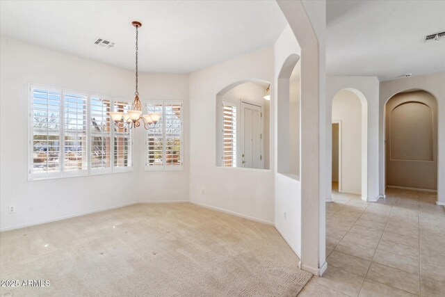 interior space featuring a chandelier