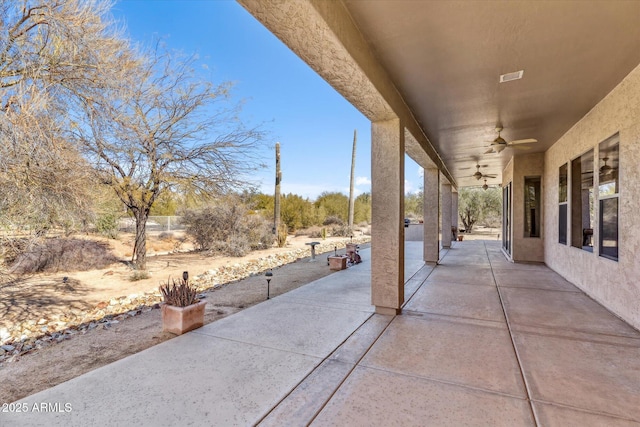 view of patio with ceiling fan