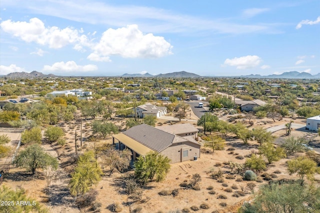 drone / aerial view featuring a mountain view