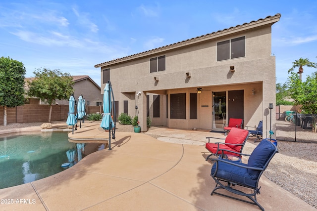 view of swimming pool featuring a fenced backyard, a fenced in pool, and a patio