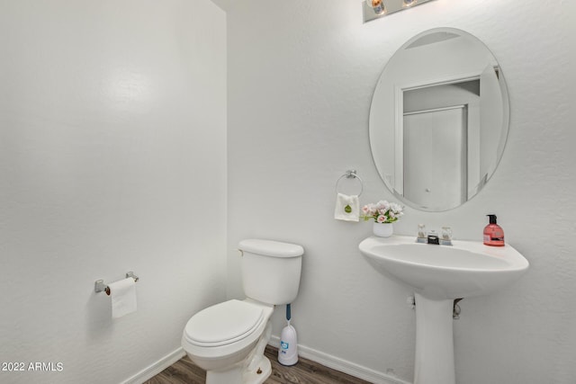 6537 W Riva Rd, Phoenix, AZ 85043 - bathroom with hardwood / wood-style flooring and toilet