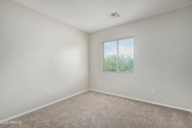 6537 W Riva Rd, Phoenix, AZ 85043 - spare room with carpet floors
