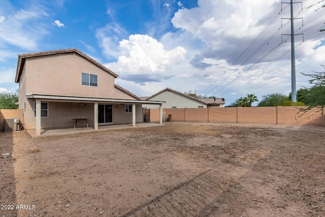 6537 W Riva Rd, Phoenix, AZ 85043 - back of property featuring central AC unit and a patio