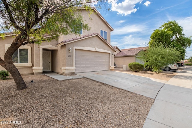 6537 W Riva Rd, Phoenix, AZ 85043 - view of front of home with a garage