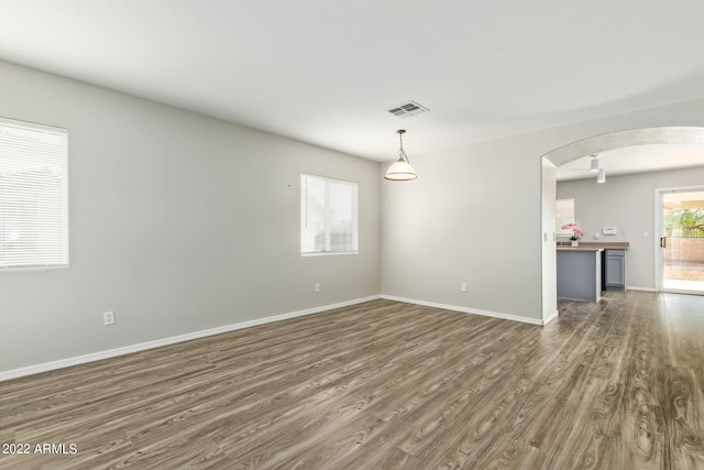6537 W Riva Rd, Phoenix, AZ 85043 - unfurnished room with dark hardwood / wood-style flooring