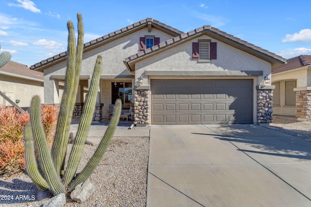 view of front of home with a garage