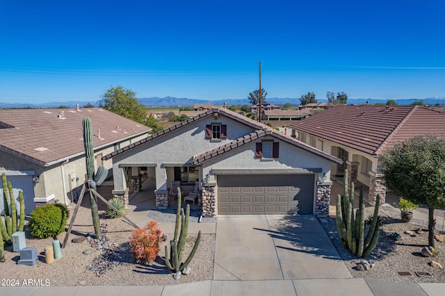 view of front of home with a mountain view