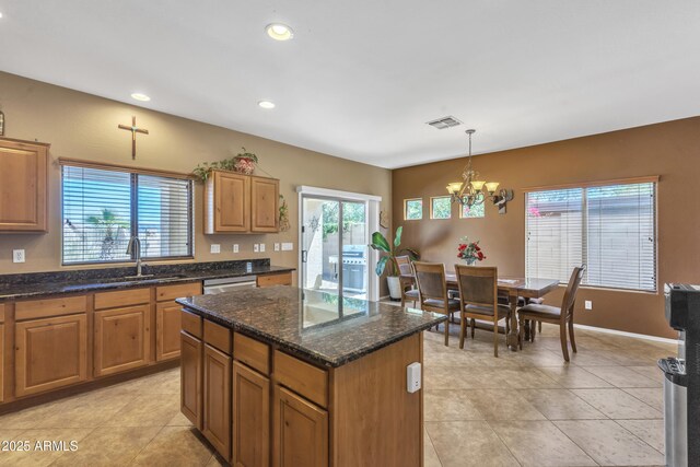 209 N 237th Ave, Buckeye, AZ 85396 - kitchen with a sink, a chandelier, light tile patterned floors, dishwasher, and recessed lighting