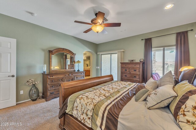 209 N 237th Ave, Buckeye, AZ 85396 - bedroom with light colored carpet, multiple windows, baseboards, and ceiling fan