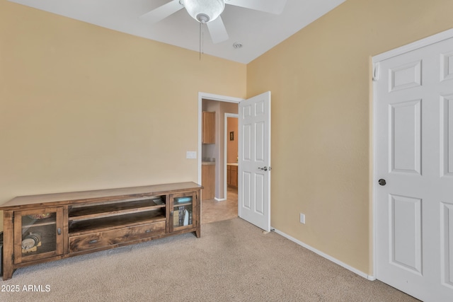 209 N 237th Ave, Buckeye, AZ 85396 - unfurnished bedroom with carpet, baseboards, and a ceiling fan