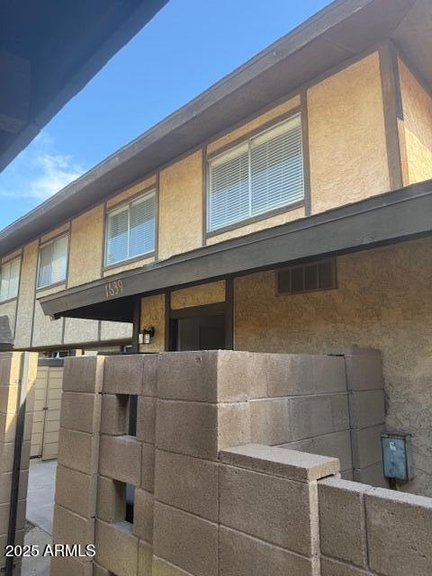 exterior details with stucco siding