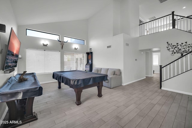 game room featuring baseboards, high vaulted ceiling, and pool table