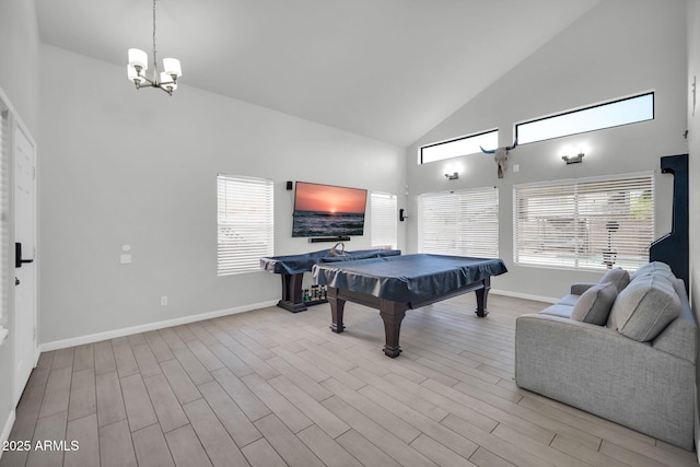 game room featuring baseboards, wood finished floors, pool table, and high vaulted ceiling