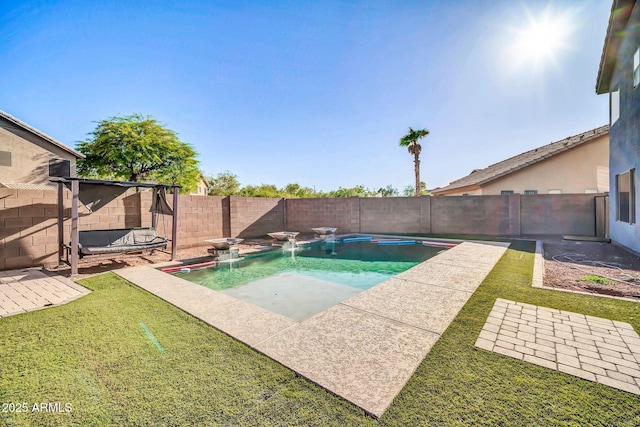 view of pool featuring a yard, a fenced in pool, a fenced backyard, and a patio area